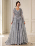 Evadne silver beaded illusion long sleeve a-line evening gown by Areen Row