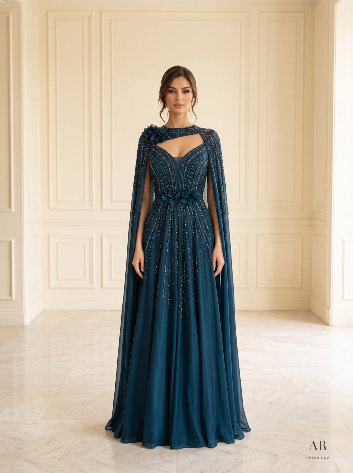 Madina floral applique a-line cape evening gown by Areen Row, detail view