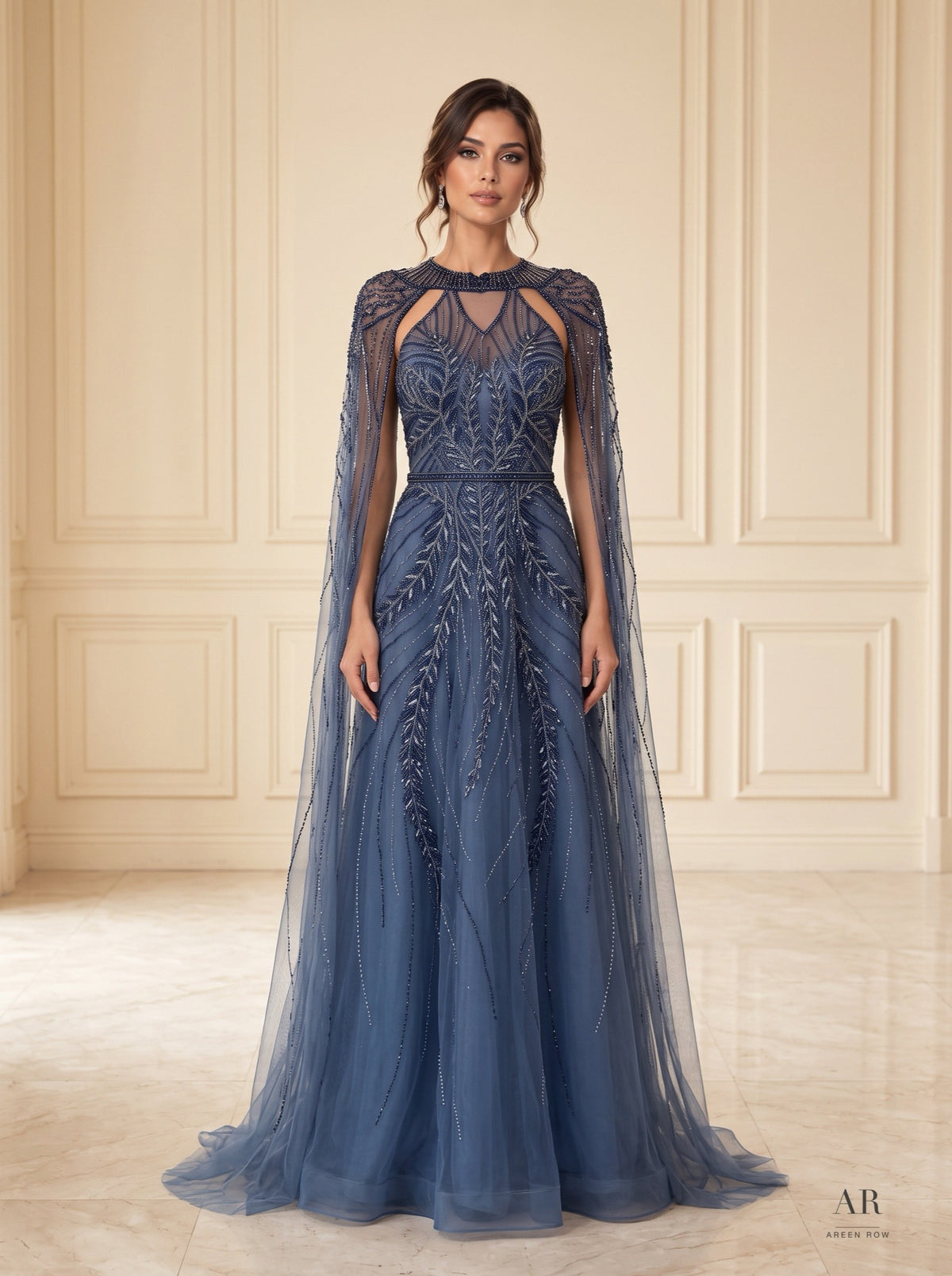 Sylvie dusty blue beaded illusion a-line cape evening gown by Areen Row