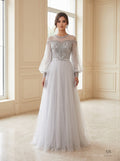 Xenia silver embellished illusion a-line tulle evening gown by Areen Row